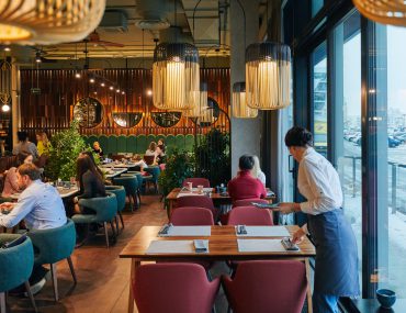 A restaurant with people dining