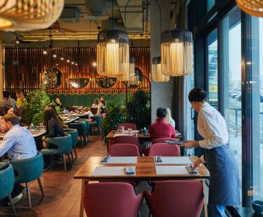 A restaurant with people dining