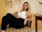 Athens Hookup | Where to Pick Up and Date Girls in Athens Beautiful blonde girl sitting on a couch