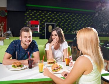 Group of local singles hanging out in a cafe