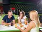 Group of local singles hanging out in a cafe