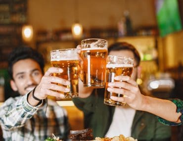 Guy friends in a pub
