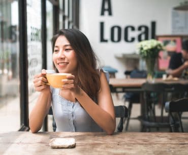 Fort Collins Hookup | Where to Pick Up and Date Girls in Fort Collins Young woman drinking coffee in a cafe