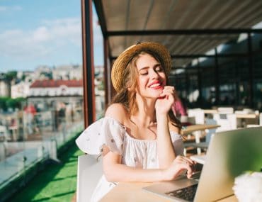 Young woman working at a cafe