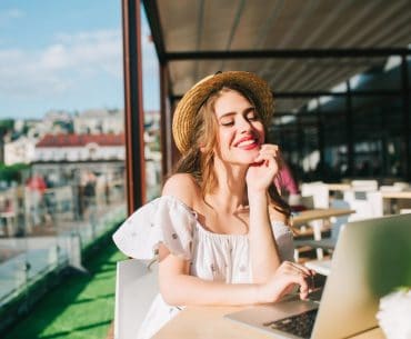 Young woman working at a cafe