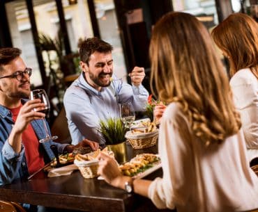 Greensboro Hookup | Where to Pick Up and Date Girls in Greensboro Young people having a double dinner date at a restaurant