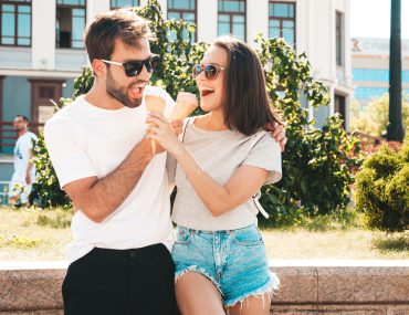 Young couple having cone ice-cream