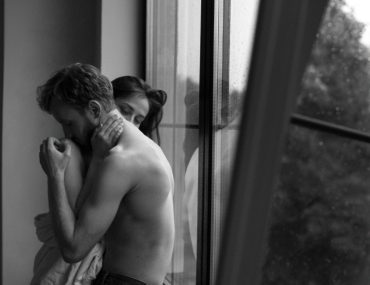 A couple having a romantic moment indoors