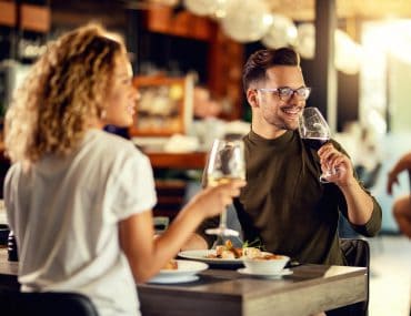 Couple on a lunch date drinking wine
