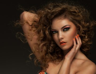 Beautiful woman with curly hair