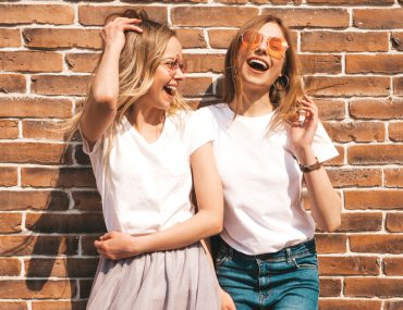 Happy girls wearing summer clothes